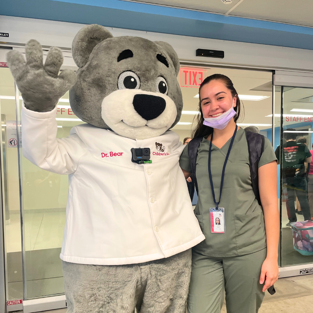 Student with hospital bear mascot